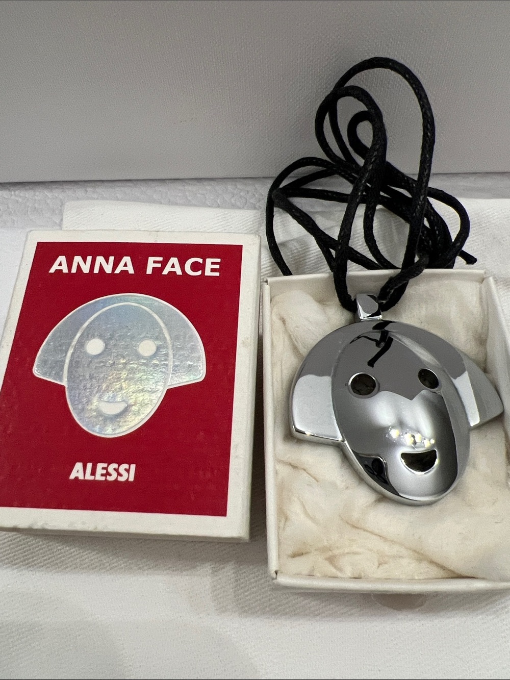 Alessi Anna Face Pendant with Black Cord